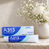 A313 retinol cream and box on a limestone windowsill with white roses